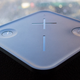 The controls. On the left you have the power button. Volume controls are in the middle. The right is the magic button, surrounded by more buttons to help you toggle between connected devices.
